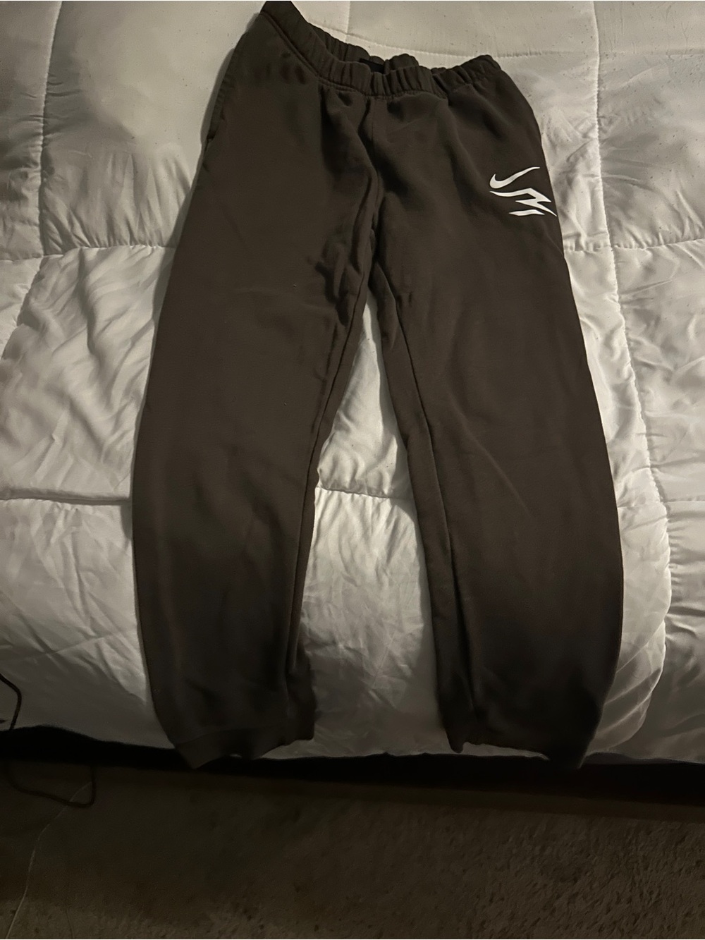 Nike black Kids Sweatpants with White Swoosh